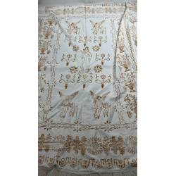 Antigua colcha robellada