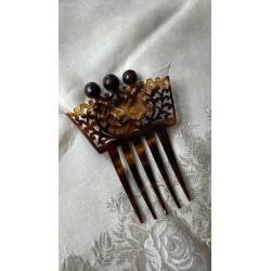 Antigua peineta de tres bolas