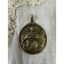 Antigua medalla de bronce....